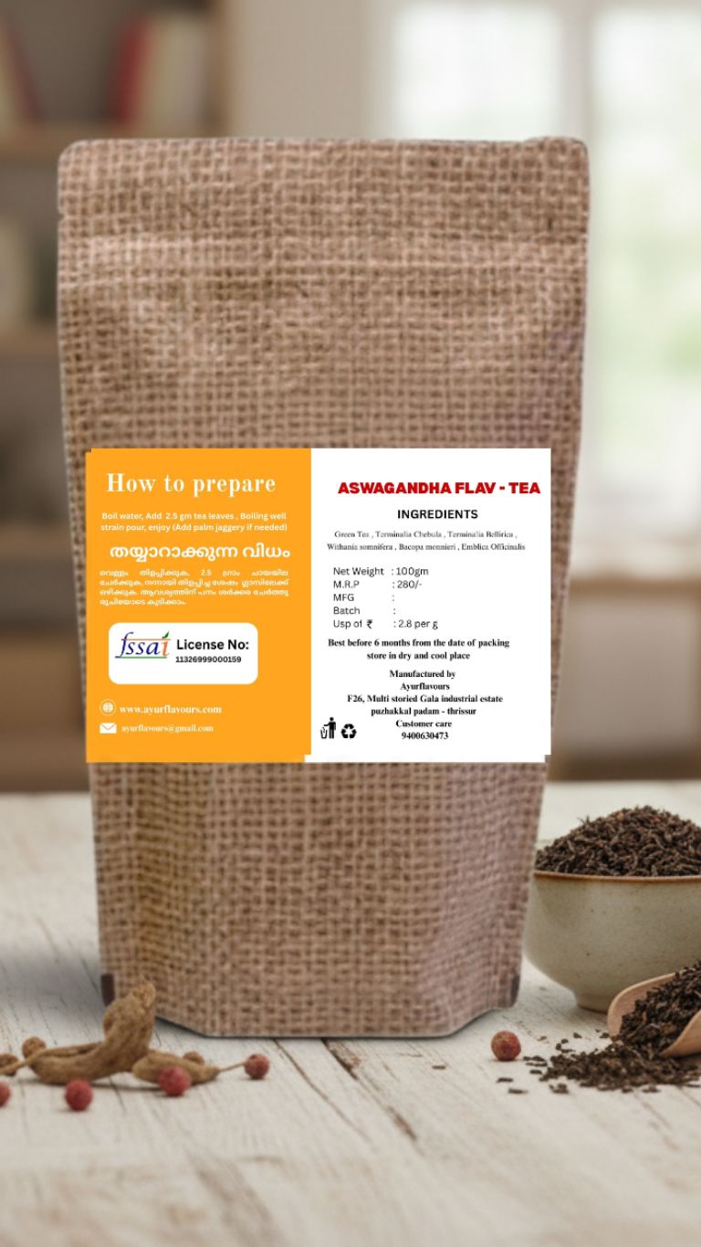 Ashwagandha flavoured tea in a clear glass cup with tea leaves and dried herbs, showcasing the herbal product from My Store.