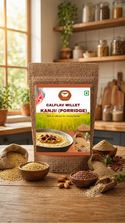 Calflav Millet Kanji porridge in a bowl, served with fresh herbs, showcasing its creamy texture and wholesome appearance.