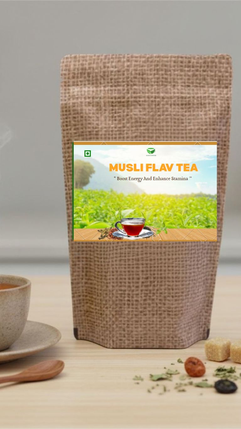 Musli Flav Tea in a clear glass cup with a tea infuser, showcasing the herbal blend and aromatic steam for a soothing beverage.